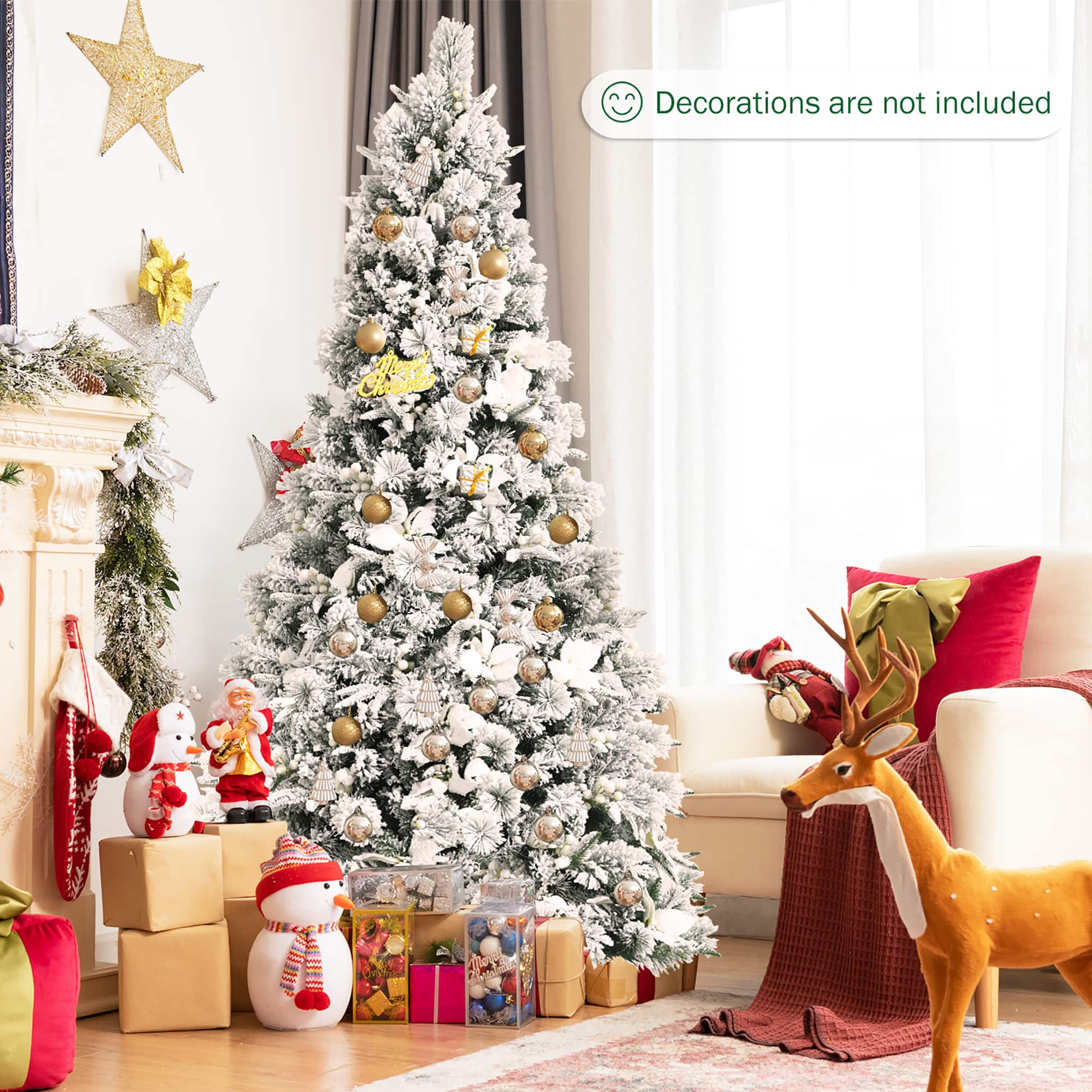 The image shows a beautifully decorated Christmas tree in a living room, with a couch and a chair nearby. The tree is adorned with ornaments and presents, creating a festive atmosphere. However, the text on the image indicates that the decorations are not included, which means that the viewer may need to purchase additional decorations to complete the festive setup.