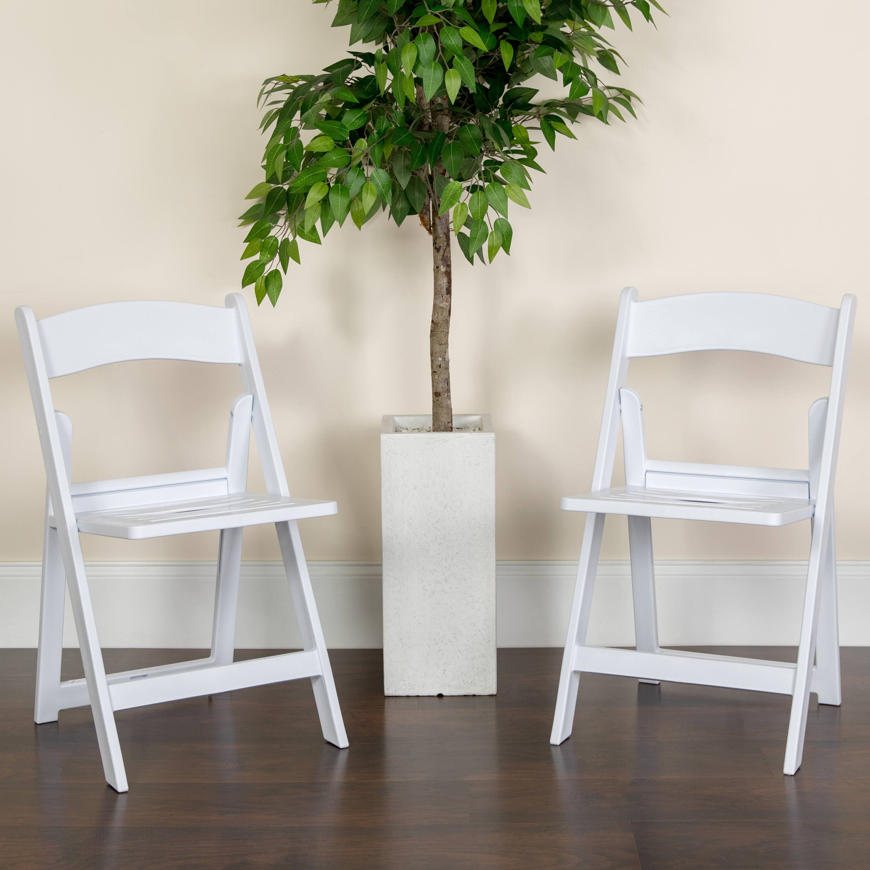 Alt View 2. Emma + Oliver - 4 Pack 800 lb. Capacity Resin Folding Chair with Slatted Seat - White.