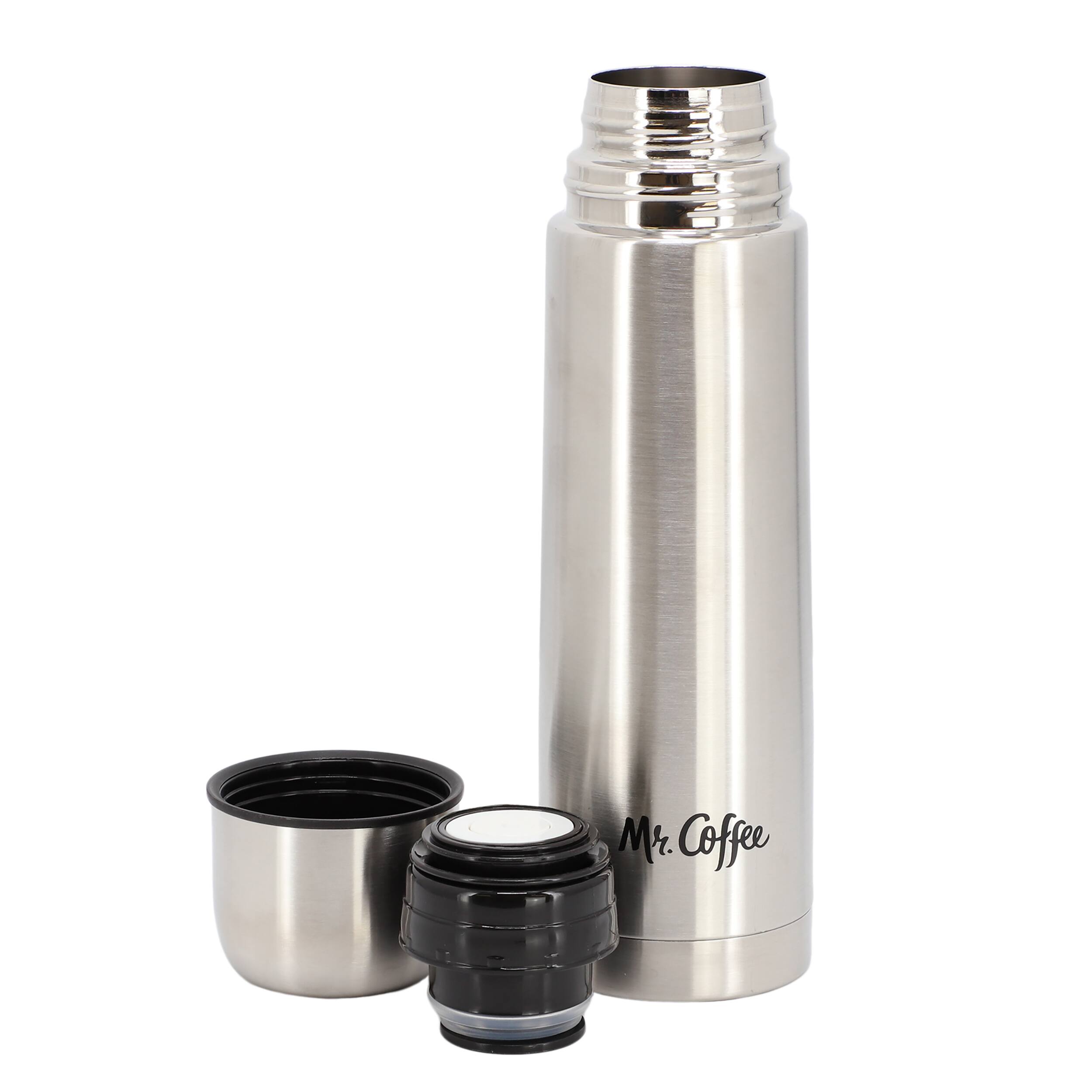 A Mr. Coffee thermos is displayed with a lid and a small cup.