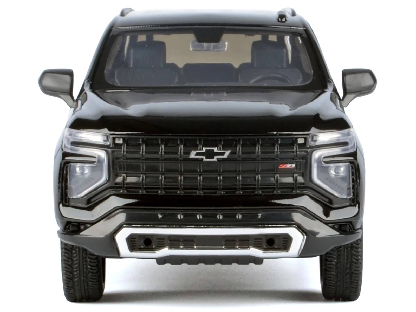Left. Motormax - 2025 Chevrolet Tahoe Z71 Black "Timeless Legends" Series 1/24 Diecast Model Car by Motormax - Black.