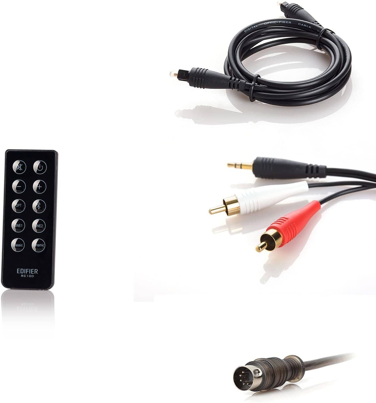 The image features a collection of electronic equipment, including a black box with a row of buttons, a black wire, and a black and red cord. There is also a black and white cord present in the image. The equipment is displayed on a white background, making the cords and wires stand out prominently.