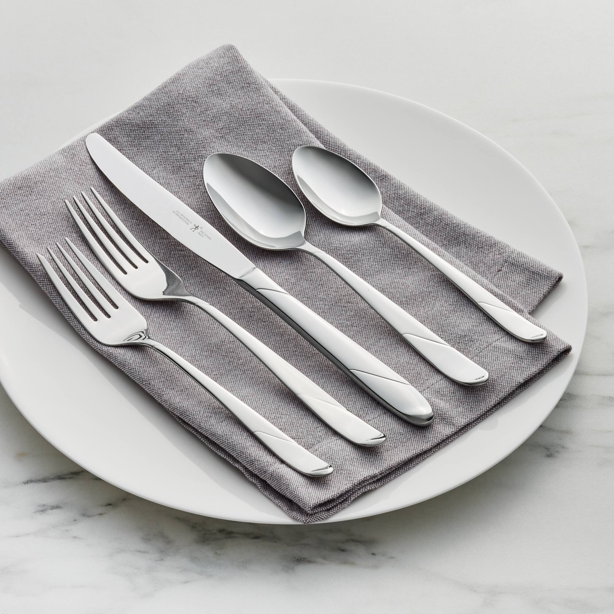 Alt View 1. Henckels - Henckels Milena 62-pc 18/10 Stainless Steel Flatware Set - Stainless Steel.