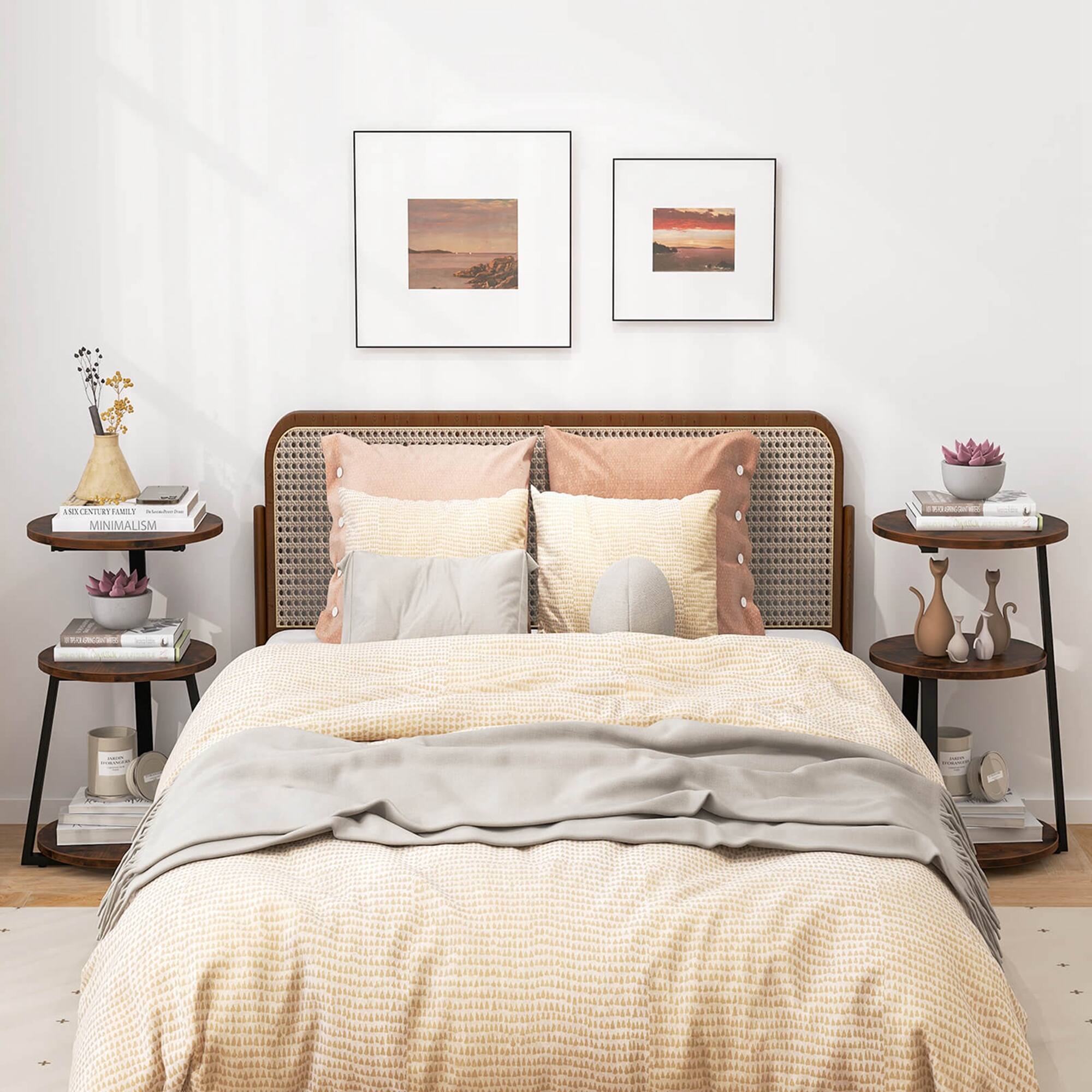 The image features a minimalist bedroom with a bed, a nightstand, and a shelf. The bed is covered with a white blanket, and there are two pillows on it. The nightstand has a vase and a book on it, while the shelf has a few books and a vase. The room also has a window, and there are two pictures hanging on the wall above the bed. The overall atmosphere of the room is simple and uncluttered, reflecting the minimalist style.