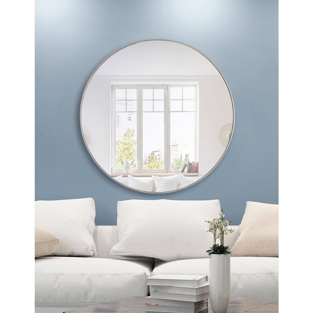 Left. Elegant Decor - Metal frame Round Mirror 48 inch Silver finish - Silver.