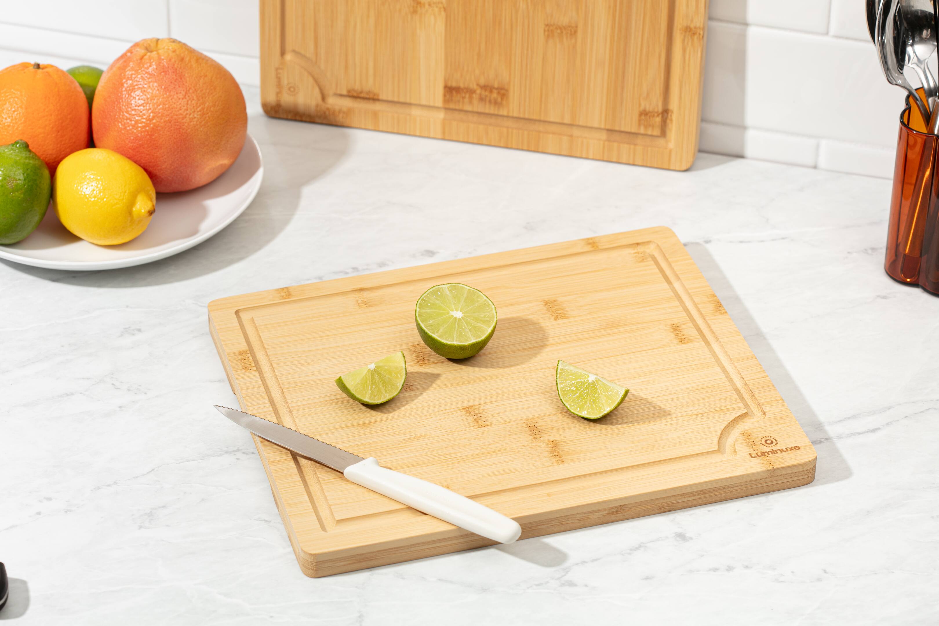 Left. Luminuxe - Bamboo Cutting Board Set of 3, Wood Cutting Boards with Juice Groove, Nonslip Cutting Board Set.