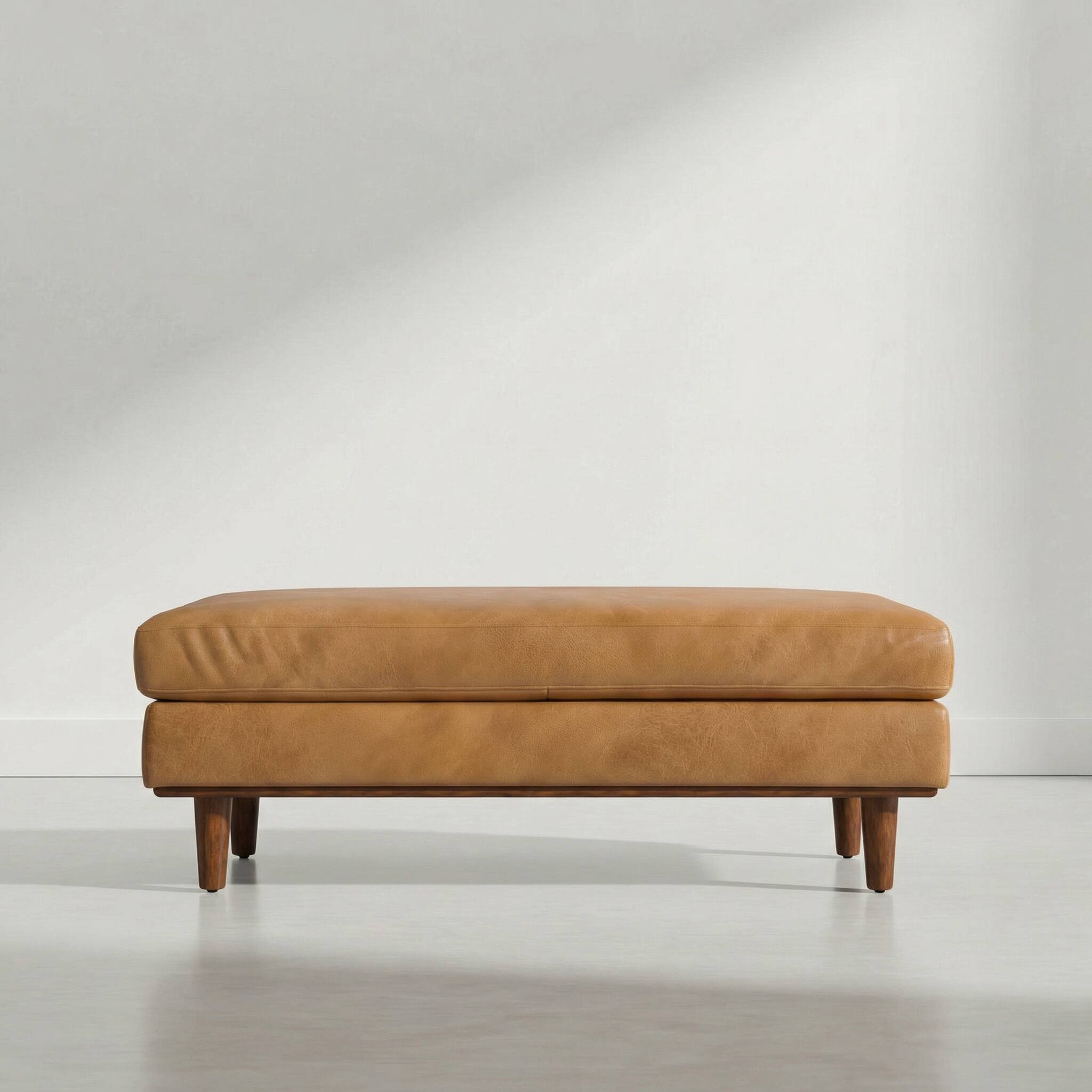 Left. Simpli Home - Morrison 49 inch Wide Genuine Leather Rectangular Ottoman, Burnt Sienna - Burnt Sienna.