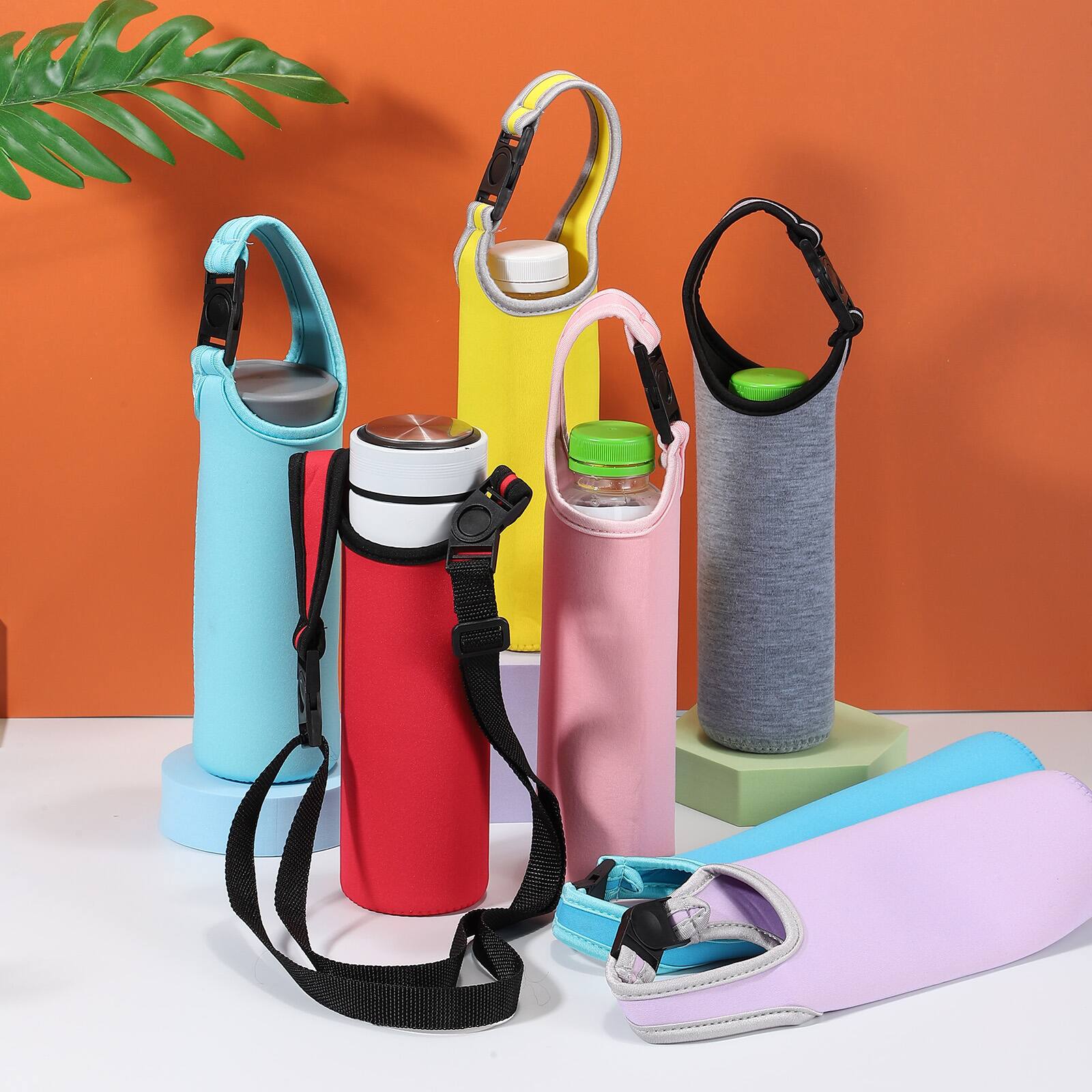 Alt View 2. Unique Bargains - 2pcs Neoprene Water Bottle Sleeve, 15.5-20oz Insulated Carrier Bag with 2 Straps for Travel - Brown.