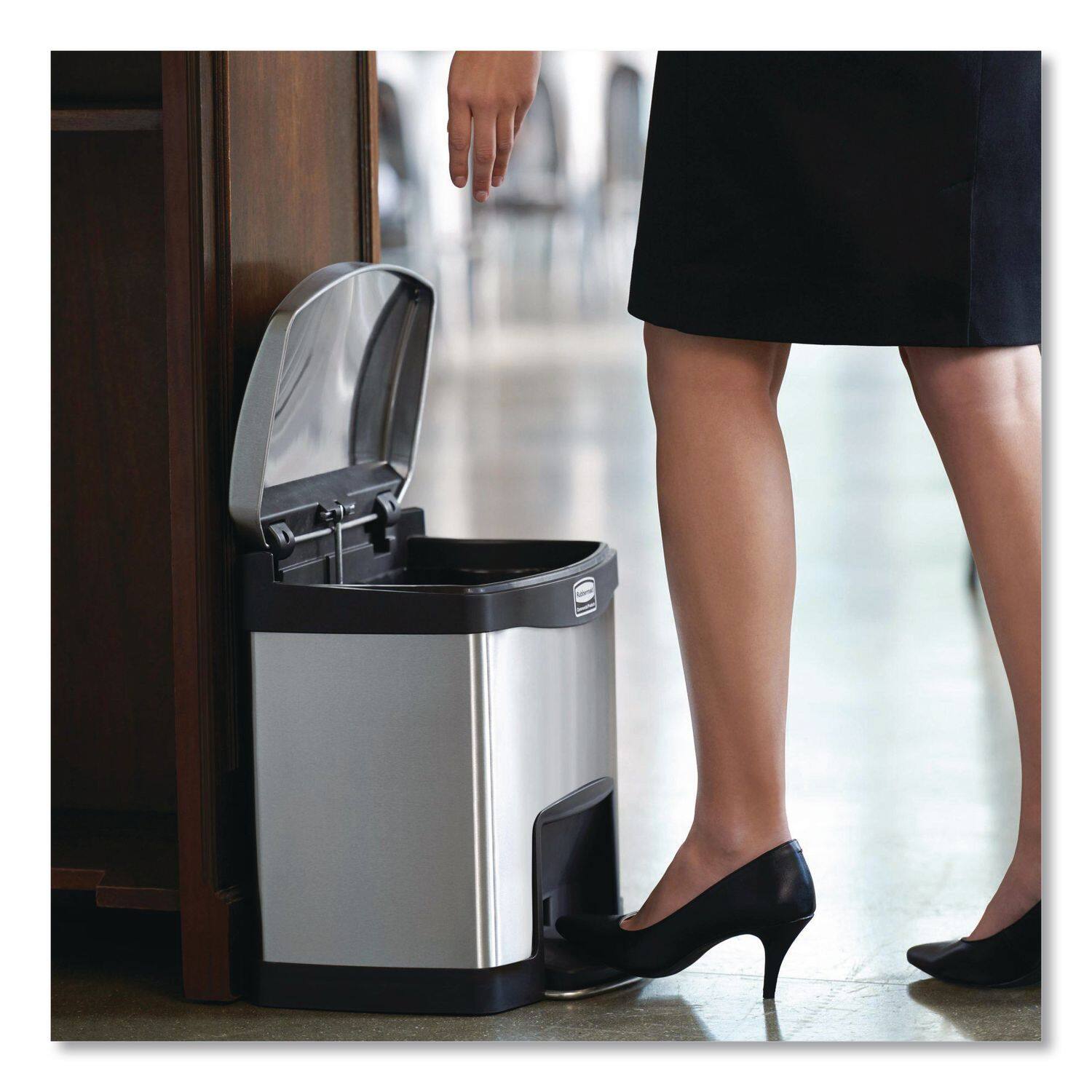 Left. RubberMaid - Slim Jim Stainless Steel Step-On Container, Front Step Style, 4 gal, Stainless Steel, Black.