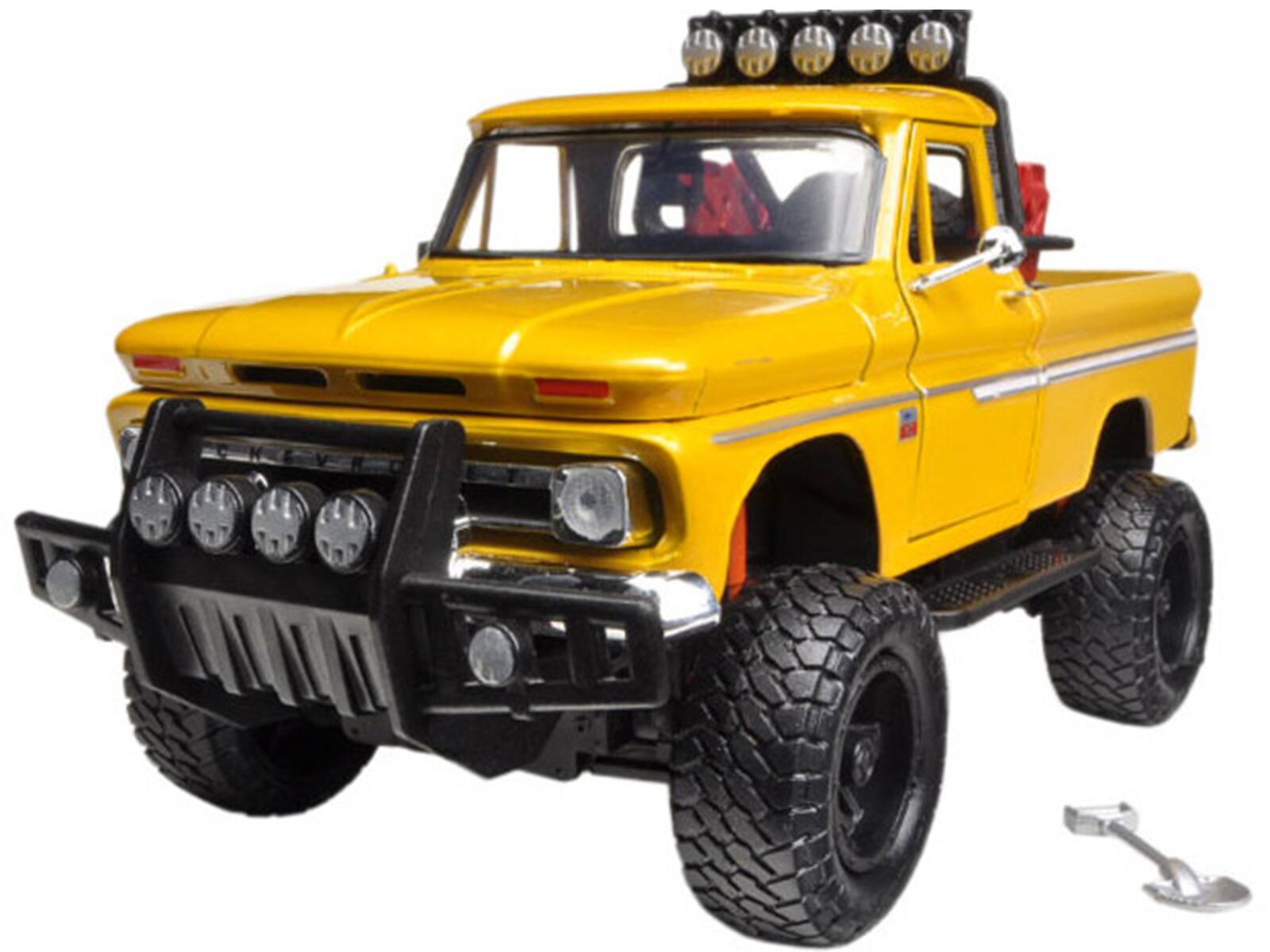 Angle. Motormax - 1966 Chevrolet C10 Fleetside Pickup Truck Off Road Yellow 1/24 Diecast Model by Motormax - Yellow.