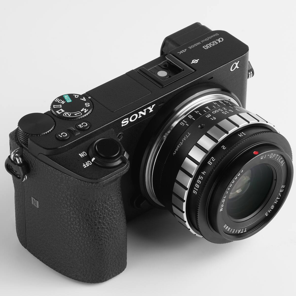 SteadyShot 0059>0 INSIDE 4K  
a N AUTO P SCN A I G D 2 1 M CS C1 NO OFF h E 4  
I I S IT I 8 S 5T9 g  
SONY 16 1 -  
E TT H TTArtisan 2 2.8 4 5.6816  
AAEON NU.DC TTATtISan U/ -OPTICAL ES PINES