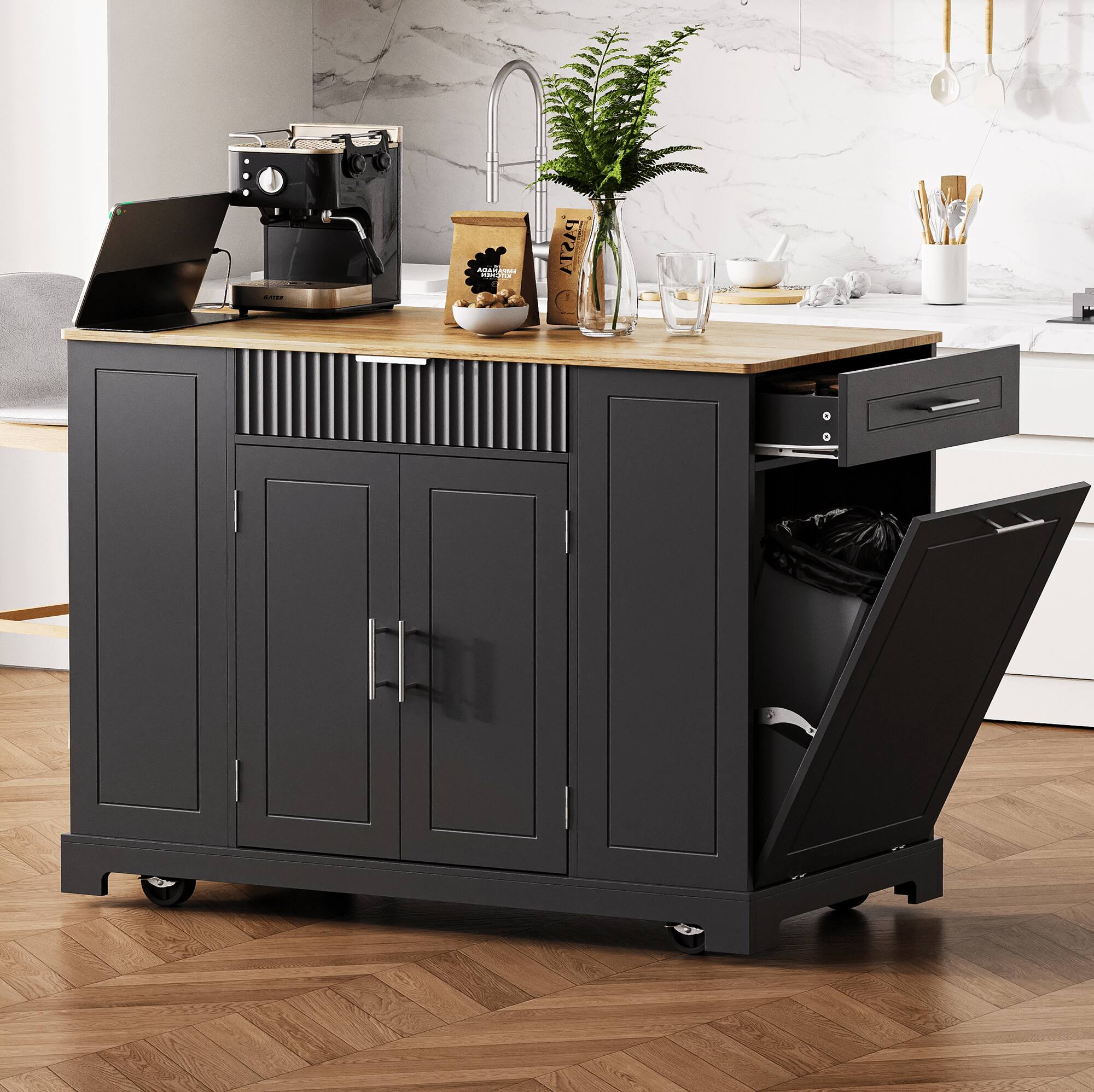 Angle. Mirfee - Fluted Kitchen Island with Trash Storage, Power Outlet, 3 Drawers, on 5 Wheels - Black.
