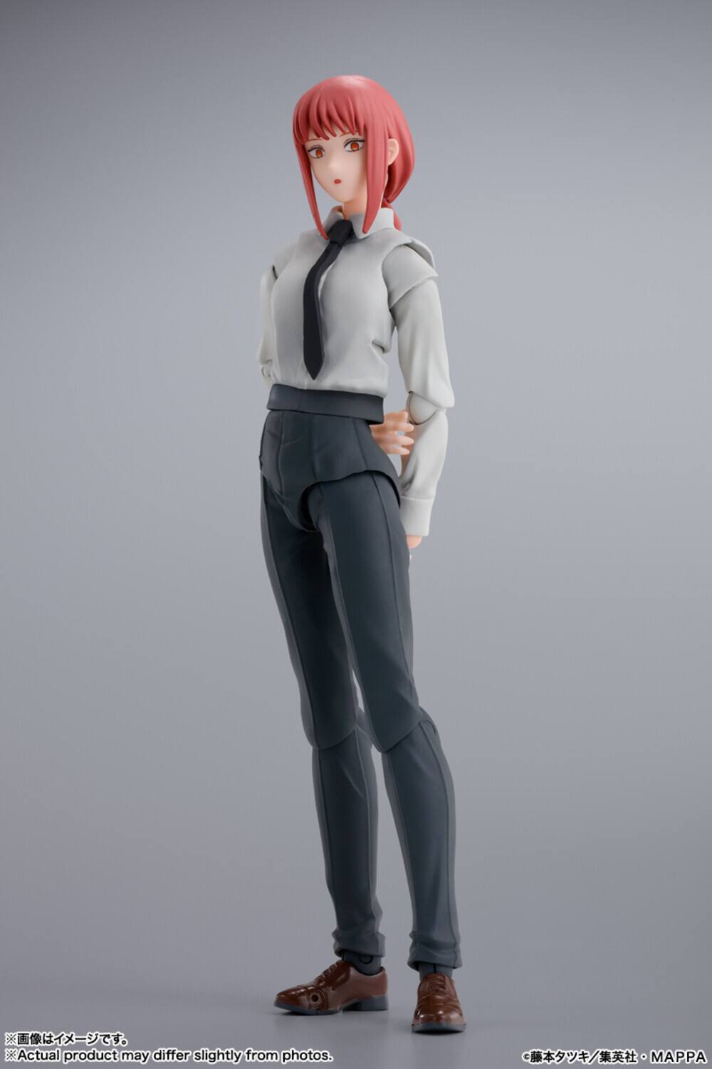 The text on the image reads:

"Actual product may differ slightly from photos."

Additionally, there is Japanese text at the bottom right corner, which includes:

"藤本ノンナ・芽生・NINA"
"MAPPA"

And at the bottom left corner:

"画像はイメージです。"
"Actual product may differ slightly from photos."