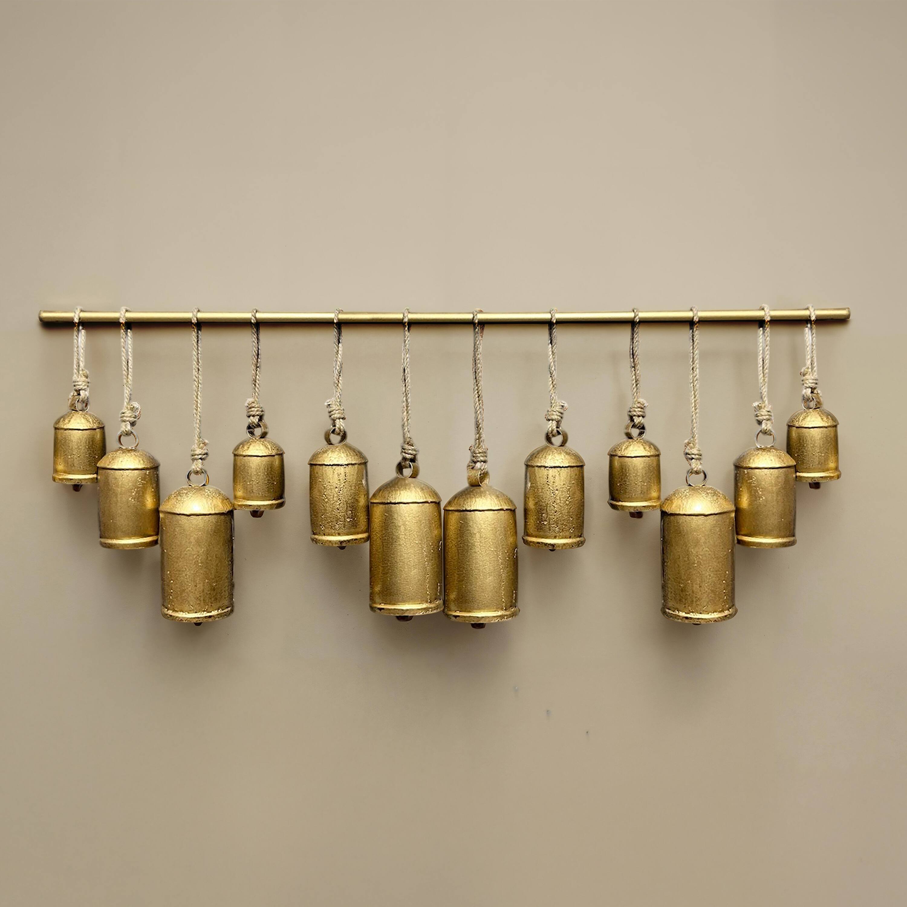 Alt View 7. Manhattan Lane - Neyra Iron Cow Bells Wall Decor 48 Inch Wide Decorative, Antique Gold Finish, Jute Hanging Rope - Gold.