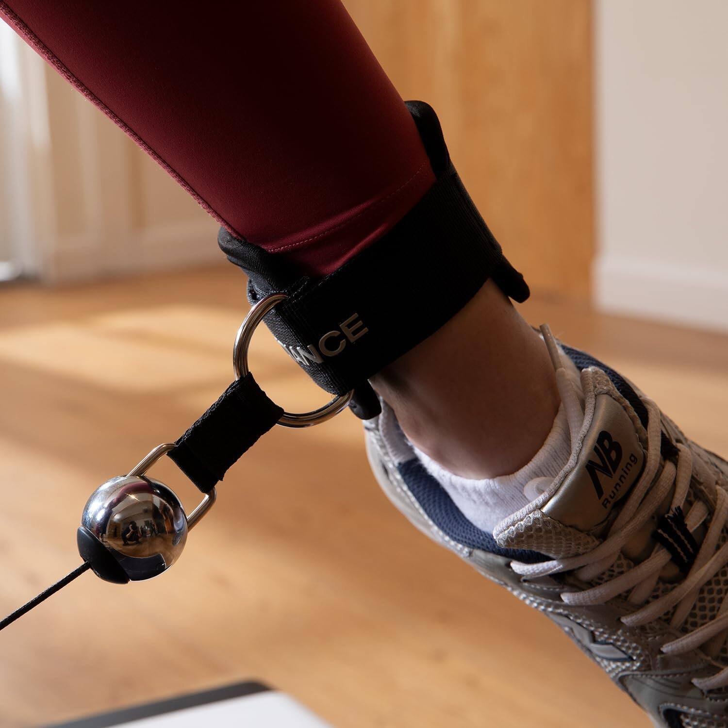 The text on the image can be grouped and corrected as follows:

- "NB Running" (on the shoe)
- "NCE" (on the ankle strap)