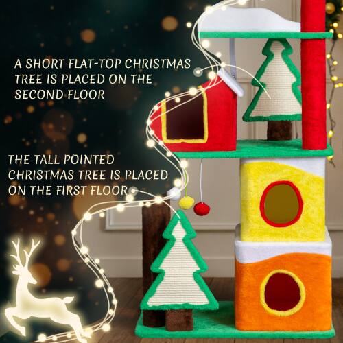 A short flat-top Christmas tree is placed on the second floor. The tall pointed Christmas tree is placed on the first floor.