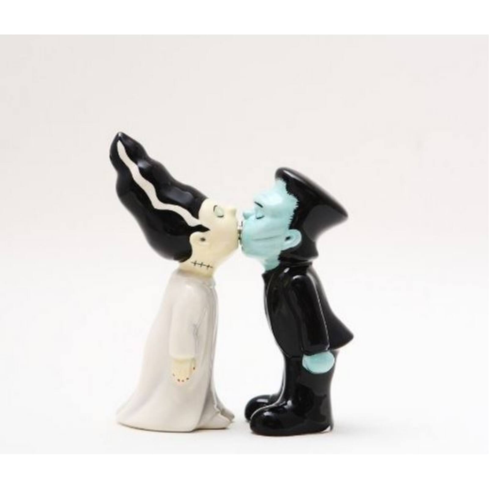 Angle. Pacific Trading - Zombie Monster And Bride Kissing Magnetic Ceramic Salt and Pepper Shaker Set - Multicolor.