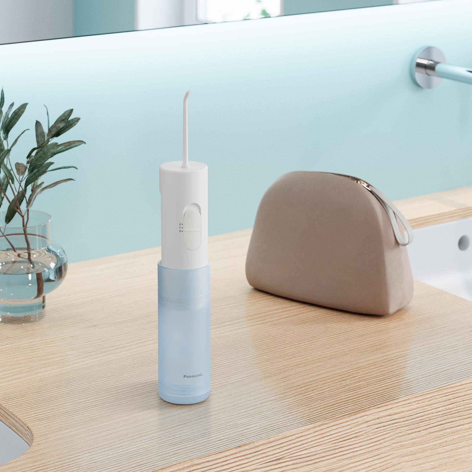 Left. Panasonic - Panasonic Portable Cordless Water Flosser EW-DJ11 - White.