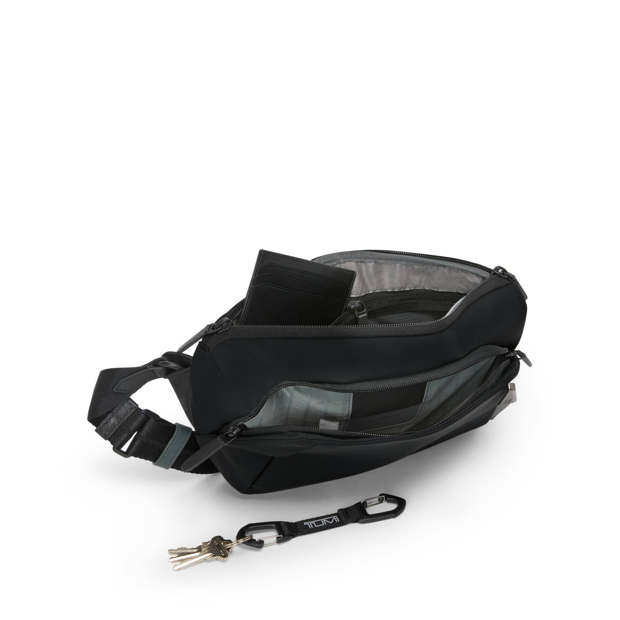 Angle. TUMI - Axis Medium Sling - Black.