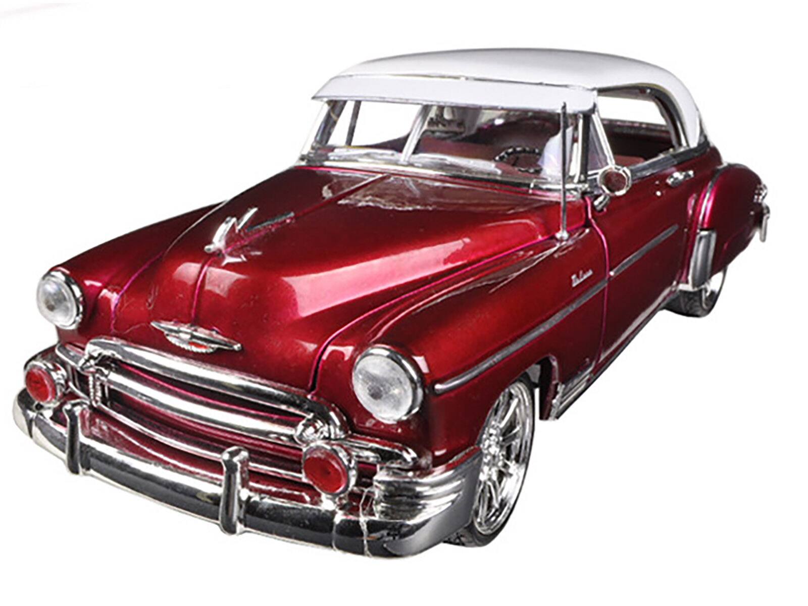 Angle. Motormax - 1950 Chevrolet Bel Air Metallic Dark Red Custom 1/18 Diecast Car Model by Motormax - Metallic Dark Red.