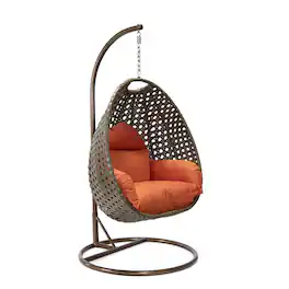 LeisureMod - Beige Wicker Hanging Egg Chair with Iron Stand & Cushion - All-Weather Single Outdoor Patio Swing - Orange
