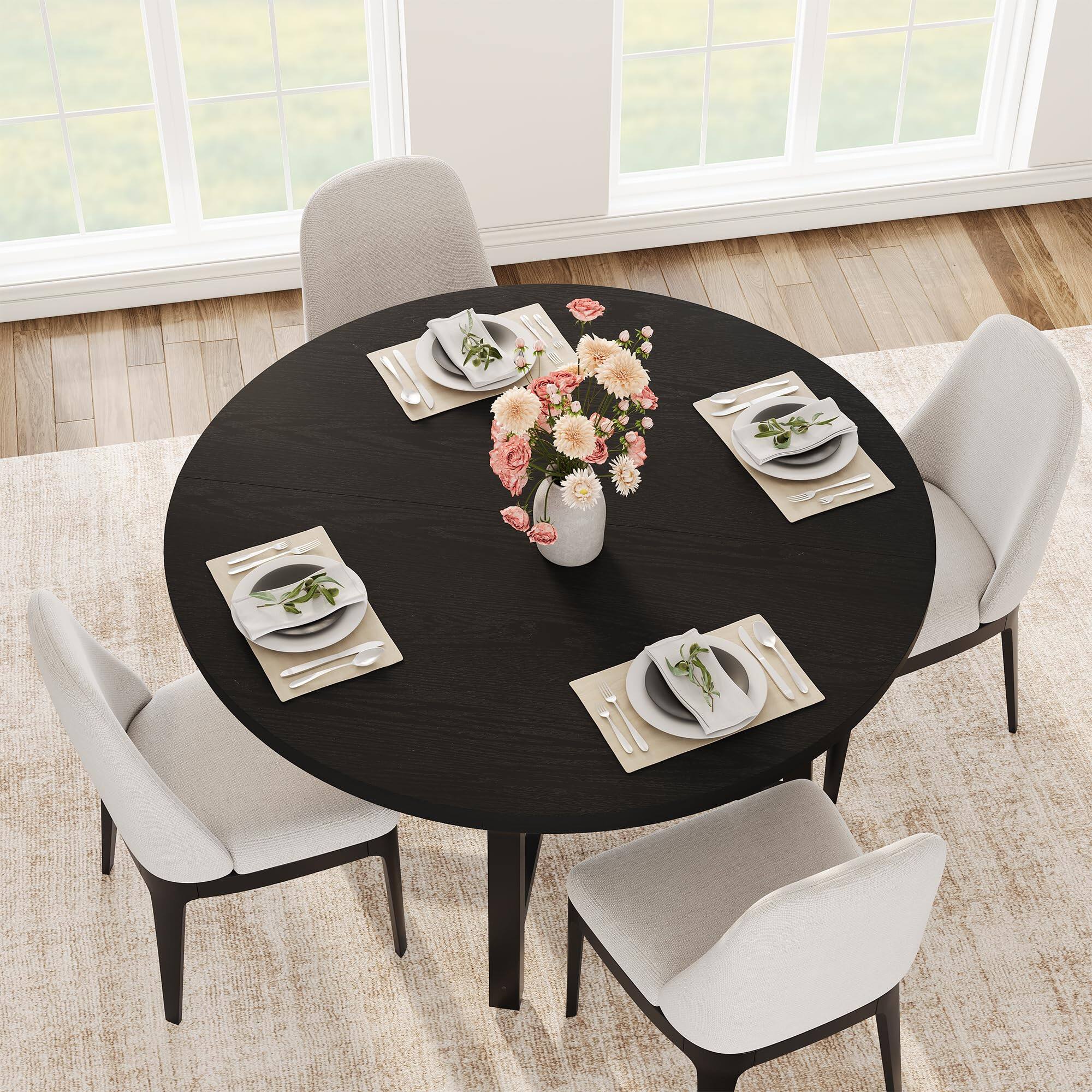 Angle. Jojoka - 47" Round Dining Table for 4 to 6, Industrial Wooden Dinner Table with Sturdy Metal Frame - Black.