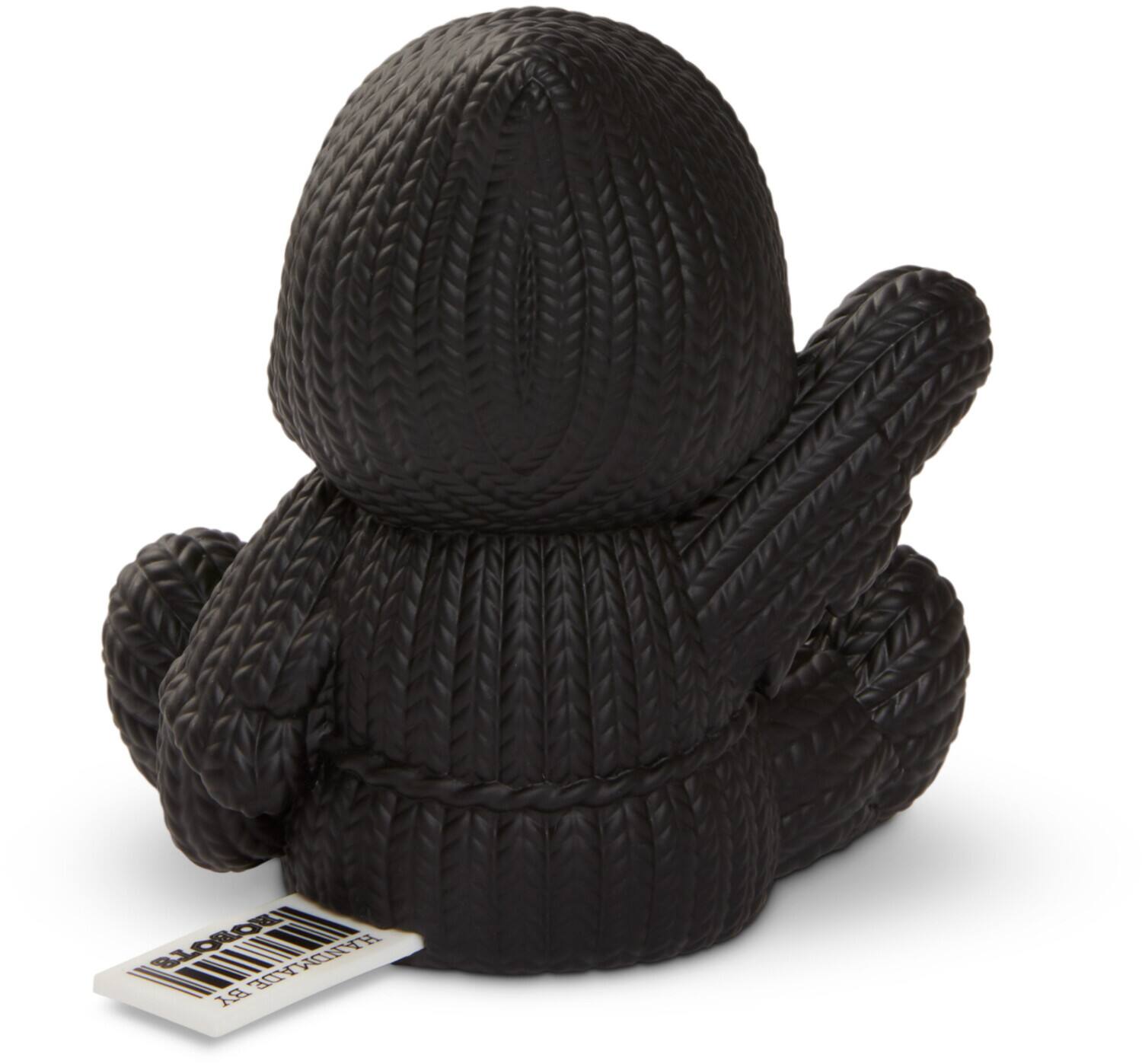 A tin robot is handmade by