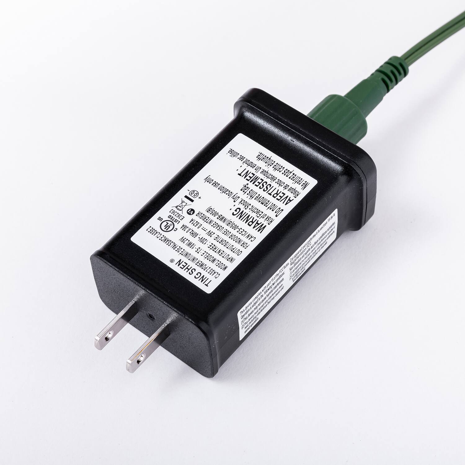 Sure, here is the corrected and grouped text from the image:

---

**Model:** TING 1

**Input:** 120V-60Hz

**Output:** 5V 2A

**Warning:** Risk of electric shock. Do not immerse in water. Do not expose to rain or moisture. Do not use in damp or wet locations.

**Caution:** Do not use in areas where explosive gases or dusts are present.

**Made in China**

**CE, FCC, RoHS**

**UL Listed**

**Warning:** Risk of electric shock. Do not immerse in water. Do not expose to rain or moisture. Do not use in damp or wet locations.

**Do not use in areas where explosive gases or dusts are present.**

**Do not use in areas where explosive gases or dusts are present.**

**Do not use in areas where explosive gases or dusts are present.**

**Do not use in areas where explosive gases or dusts are present.**

**Do not use in areas where explosive gases or dusts are present.**

**Do not use in areas where explosive gases or dusts are present.**

**Do not use in areas where explosive gases or dusts are present.**

