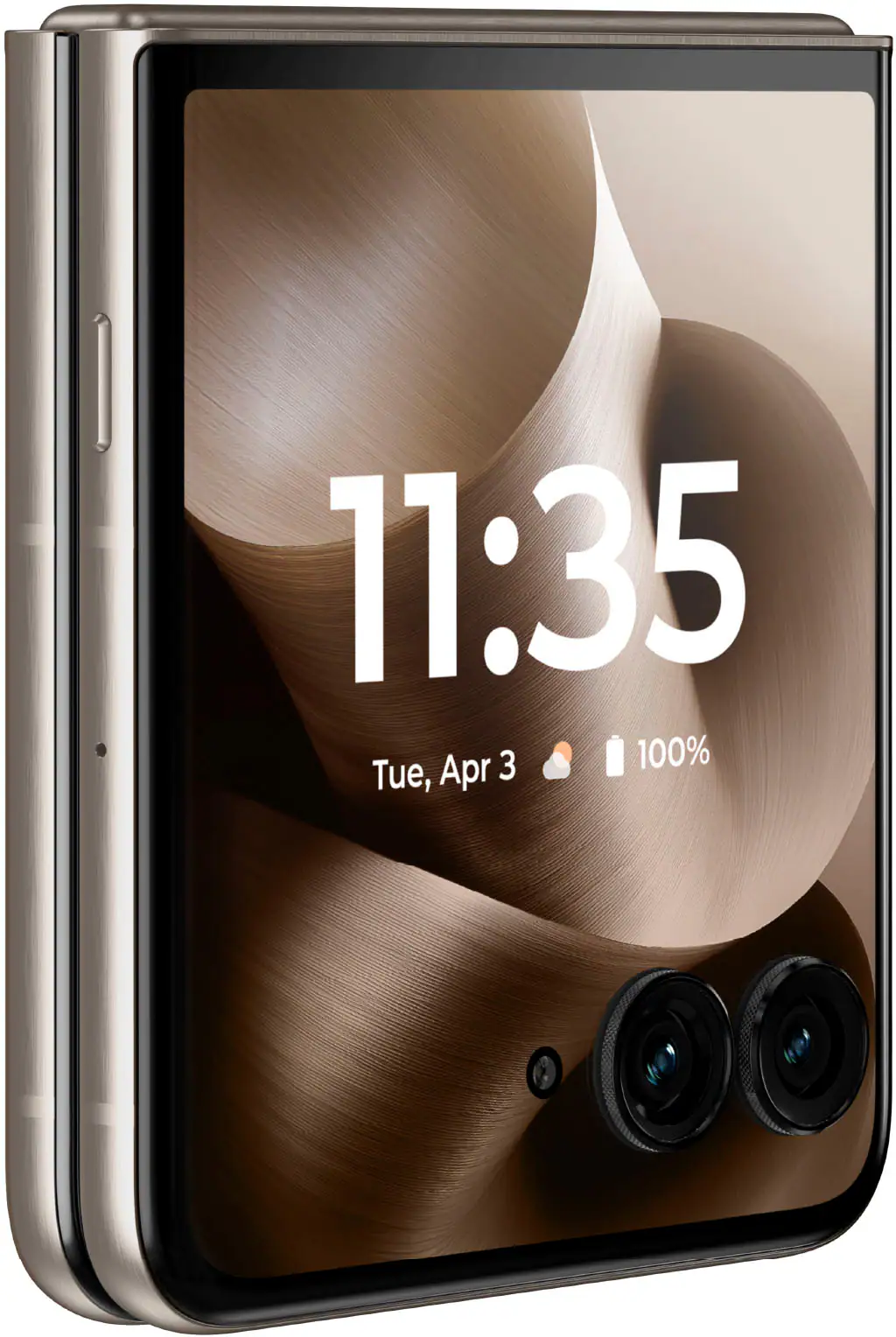 The time displayed on the cell phone is 11:35. The date is Tuesday, April 3rd. The battery is at 100%.