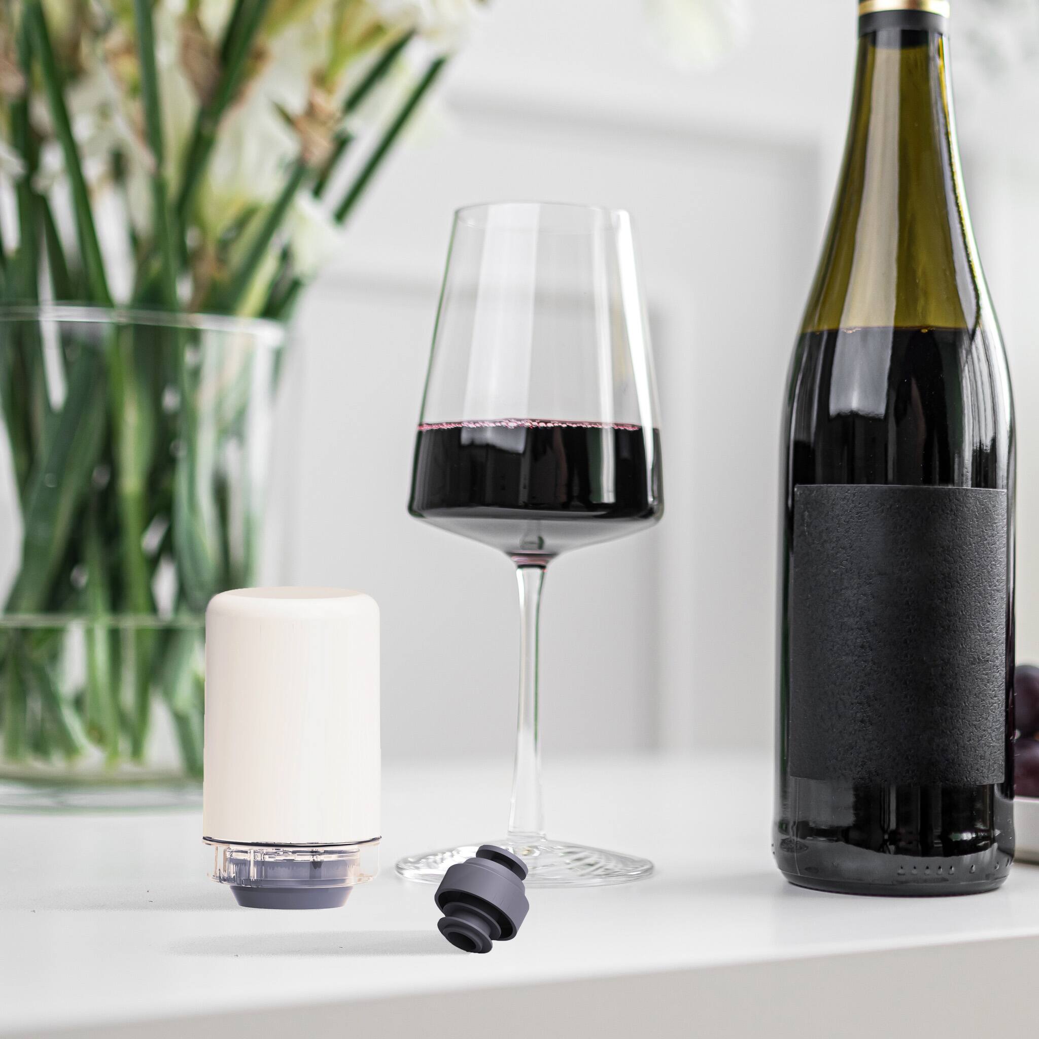 Angle. Preservio - Wine Fresh for 5x Longer – Precision Pressure + 2 Silicone Stoppers - White and Grey.