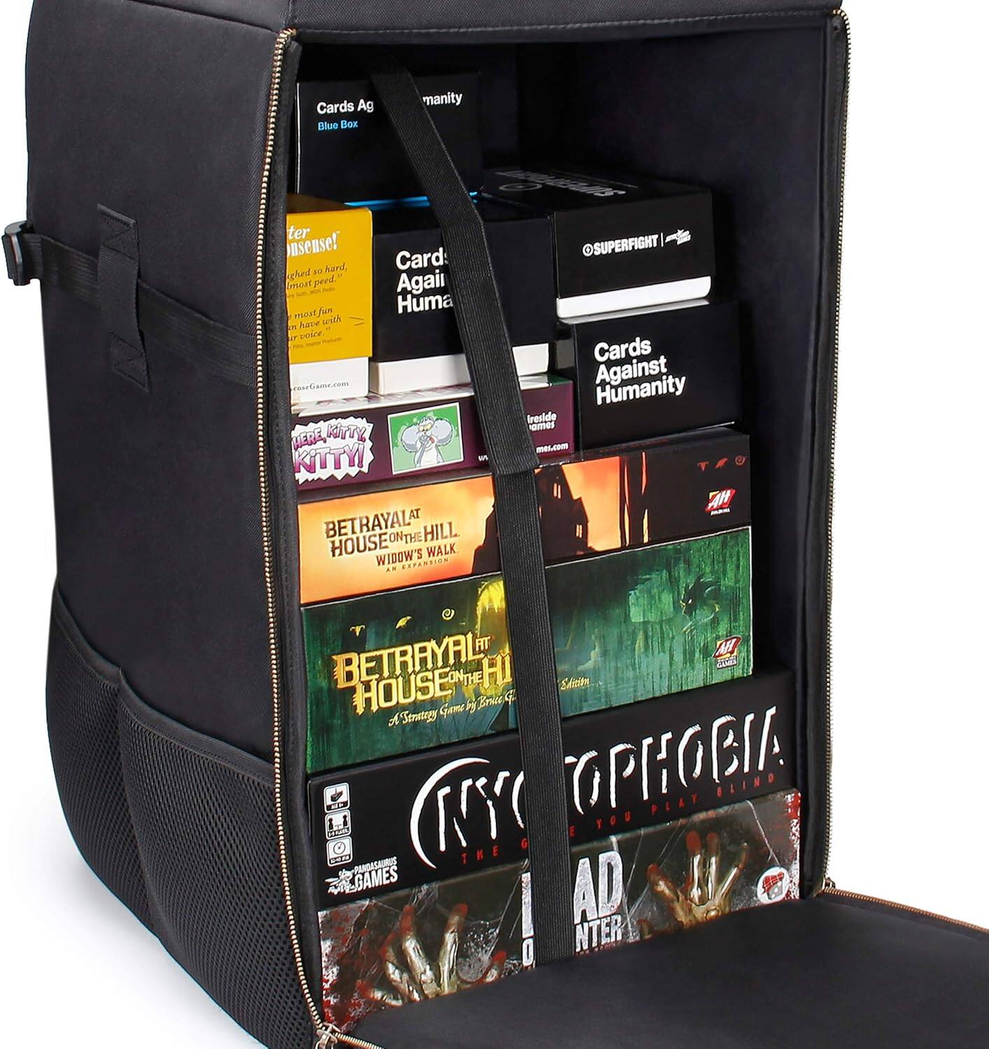 Cards Against Humanity is a card game that is included in the black backpack. The backpack is filled with various games, including Betrayal at House on the Hill, which is a cooperative board game. The backpack also contains other games like Superfight and Blind. The backpack is open, revealing the games inside.