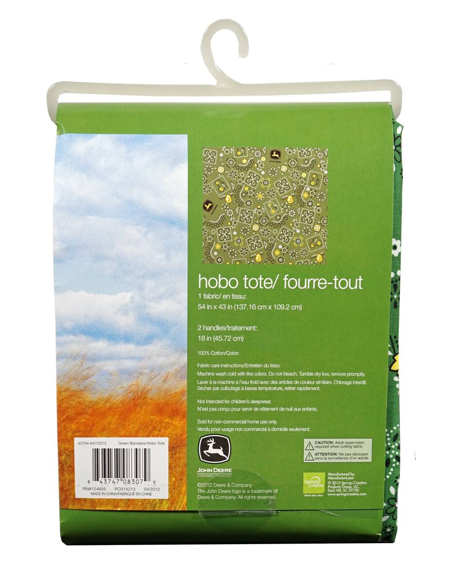 hobo tote/ fourre-tout  
1 fabric/ en tissu: 54 in x 43 in (137.16 cm x 109.2 cm)  
2 handles/ traitement: 18 in (45.72 cm)  
100% Cotton/ Coton  

Fabric care instructions/ Entretien du tissu:  
Machine wash cold with like colors. Do not bleach. Tumble dry low. Remove promptly.  
Laver à la machine à eau froide avec des articles de couleur similaire. Chlore interdit. Sécher par cubutage à basse température, retirer rapidement.  

Not intended for children's sleepwear.  
N'est pas conçu pour servir de vêtement de nuit aux enfants.  

Sold for non-commercial home use only.  
Vendu pour usage non commercial à domicile seulement.  

CAUTION: Adult supervision required when cutting fabric.  
ATTENTION: Ne pas découper sans la surveillance d'un adulte.  

Manufactured by:  
Mondacire (Sorino)  
©2012 Deere & Company  
The John Deere logo is a trademark of Deere