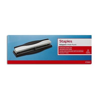 Staples  
Gripped 3-Hole Punch  
Gripped comfort grip punch  
Punches up to 15 sheets  
Durable metal construction  
Capacity: 15 sheets  
ST26639