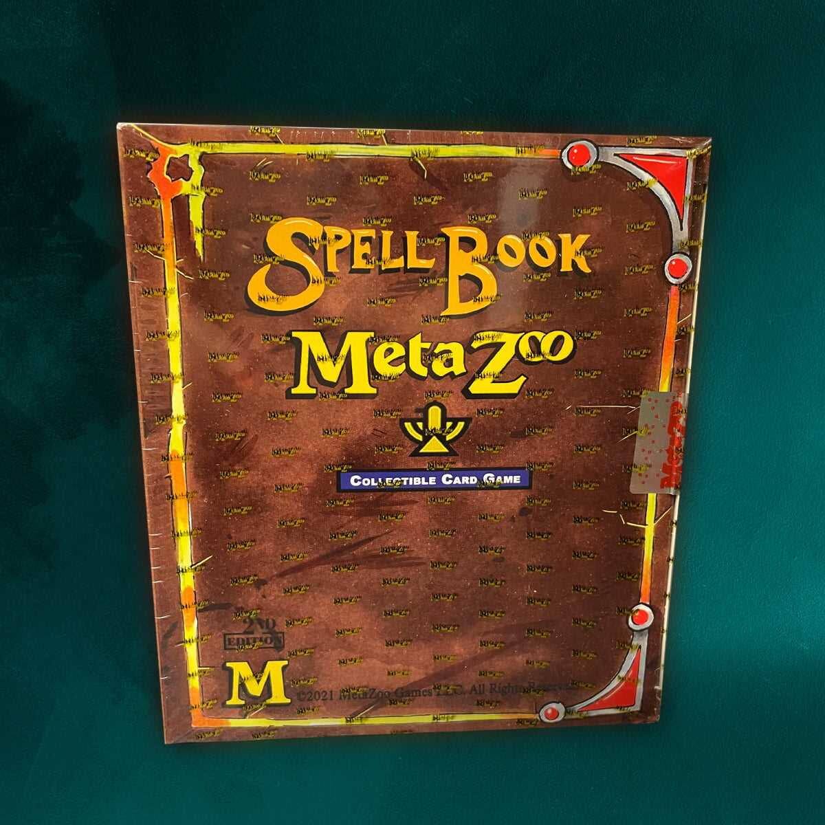 SPELL BOOK MetaZoo  
COLLECTIBLE CARD GAME  
M  
©2021 MetaZoo Games