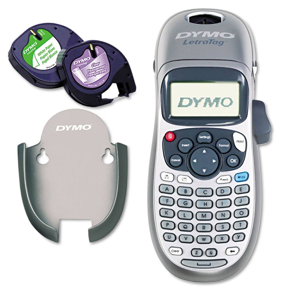 Sure, here is the corrected and grouped text from the image:

---

**DYMO LetraTag**

**White Paper Blanc Papel Blanco**

**Clear Transparente**

**DYMO LetraTag**

**Insert Settings Format PRINT Cancel OK A-C . 123 A d B . C D E F G H I J K L M N O P Q R S T U V W x y Clear Z**

**DYMO**

**Settings**  
**Insert**  
**PRINT**  
**Cancel**  
**OK**

**A B C D E F G H I J K L M N O P Q R S T U V W x y Clear Z**

---

This text is organized based on the labels and buttons visible on the DYMO LetraTag device and the labels on the tapes.
