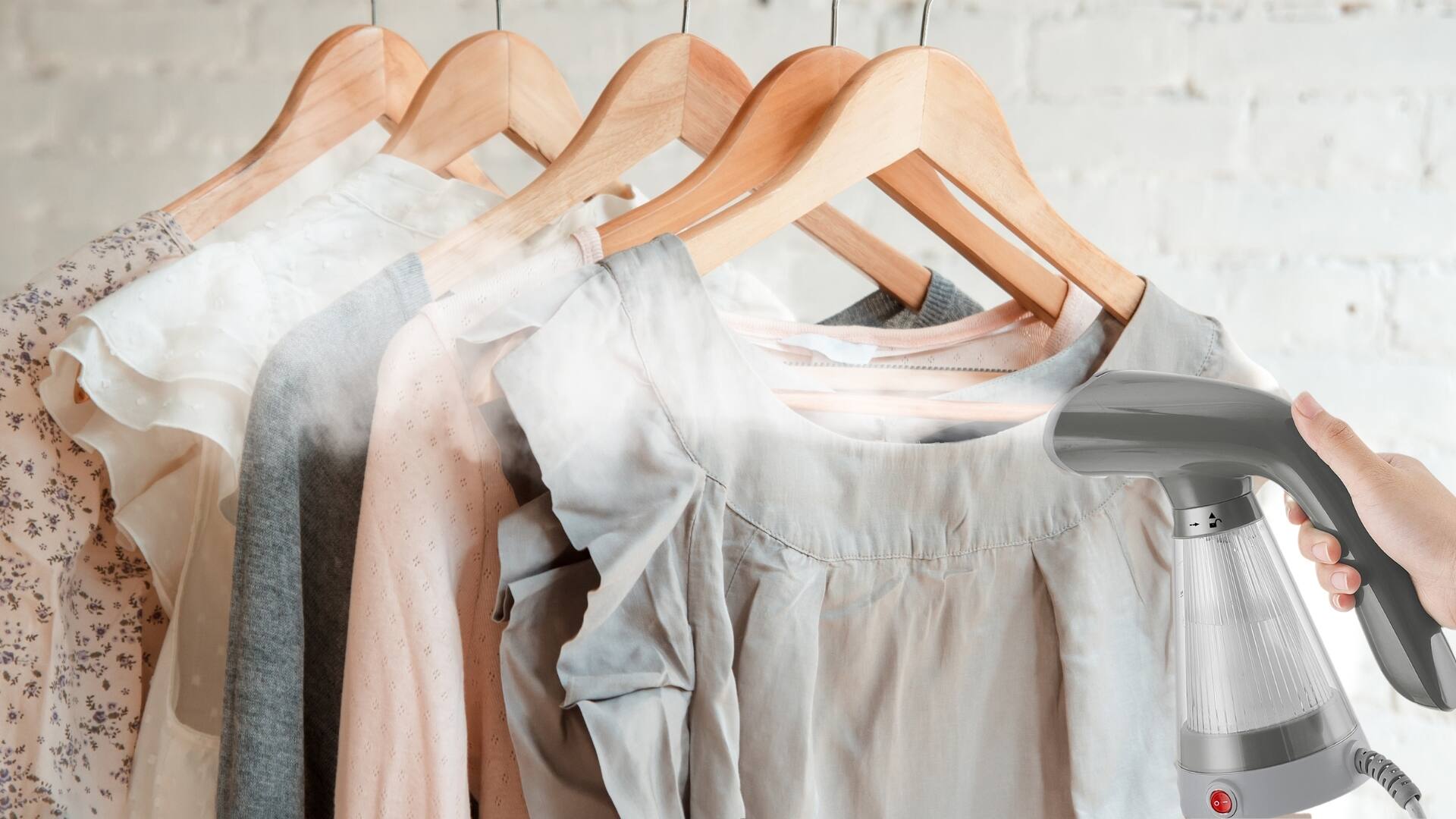 Left. True & Tidy - Compact Handheld Garment Steamer With Fabric Brush - Gray.