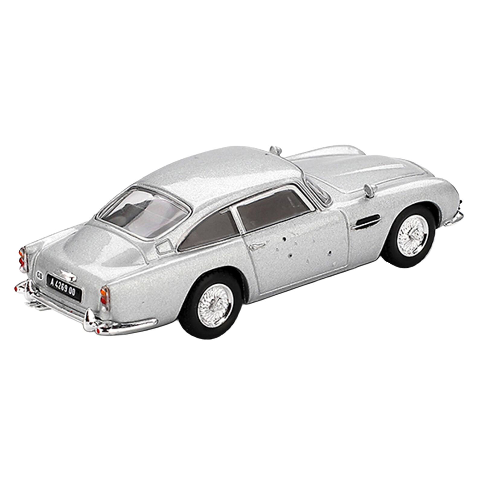 Alt View 3. True Scale Miniatures - Aston Martin DB5 RHD Birch Silver Metallic (Damaged) 007 James Bond "Skyfall" (2012) 1/64 Diecast Model Car by Mini GT.