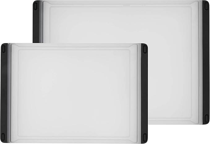 Front. PARKER SLATER - OXO Good Grips 2‑Pc Plastic Cutting Board Set – Clear, Non‑Slip.