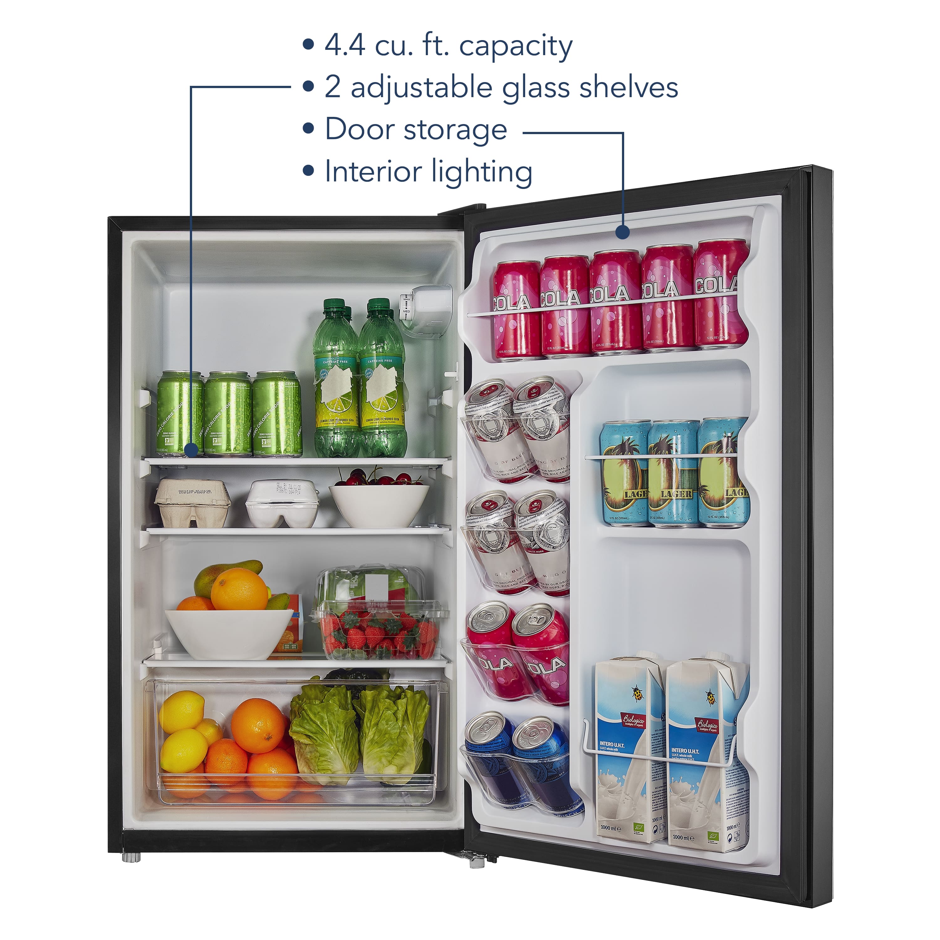 The image shows a refrigerator with a capacity of 4.4 cu. ft. It has two adjustable glass shelves and door storage. The interior of the refrigerator is illuminated by a light. The refrigerator is filled with various items, including several bottles of Ola Cola, a bowl of fruit, and a few other items.