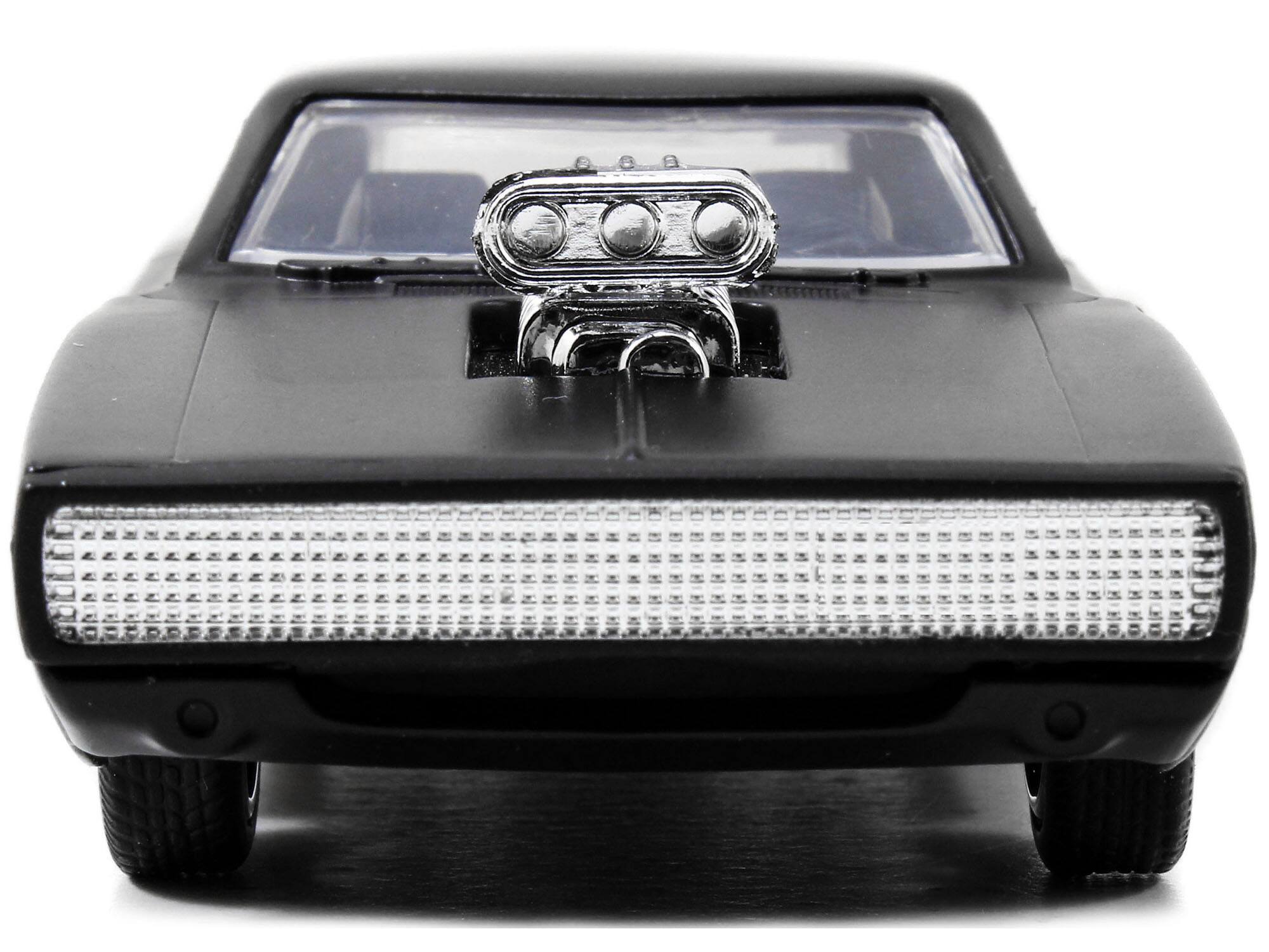 Left. Jada - Dom's Dodge Charger R/T Matt Black "Fast & Furious" Movie 1/32 Diecast Model Car by Jada - Matt Black.