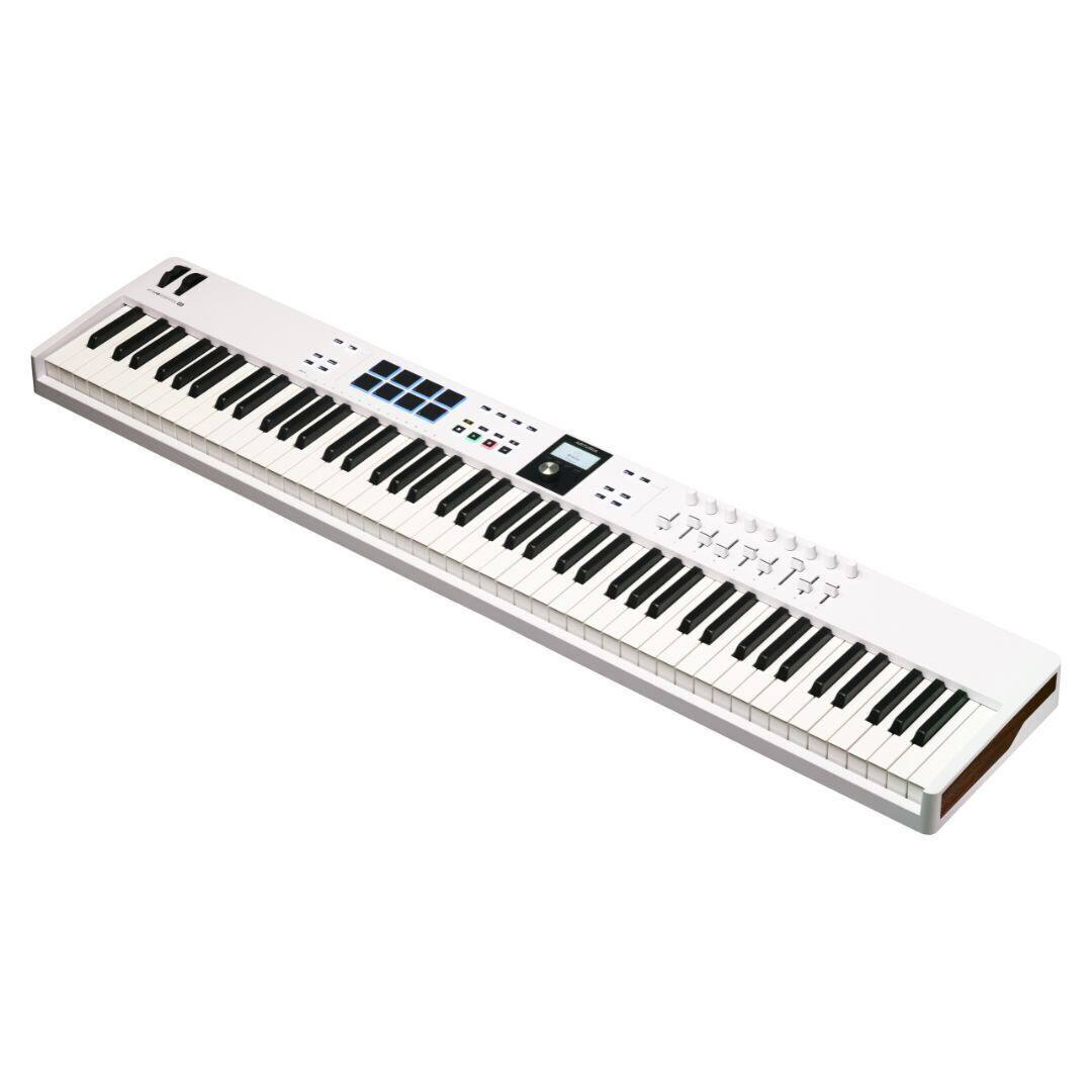 Left. Arturia - KeyLab Essential 88 mk3 88-Key MIDI Controller with Pads, Faders, Encoders, Arpeggiator, and DAW Integration - White.