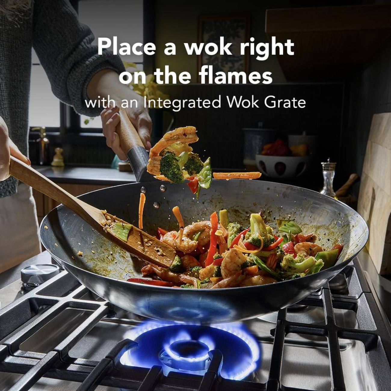Place a wok right on the flames with an Integrated Wok Grate