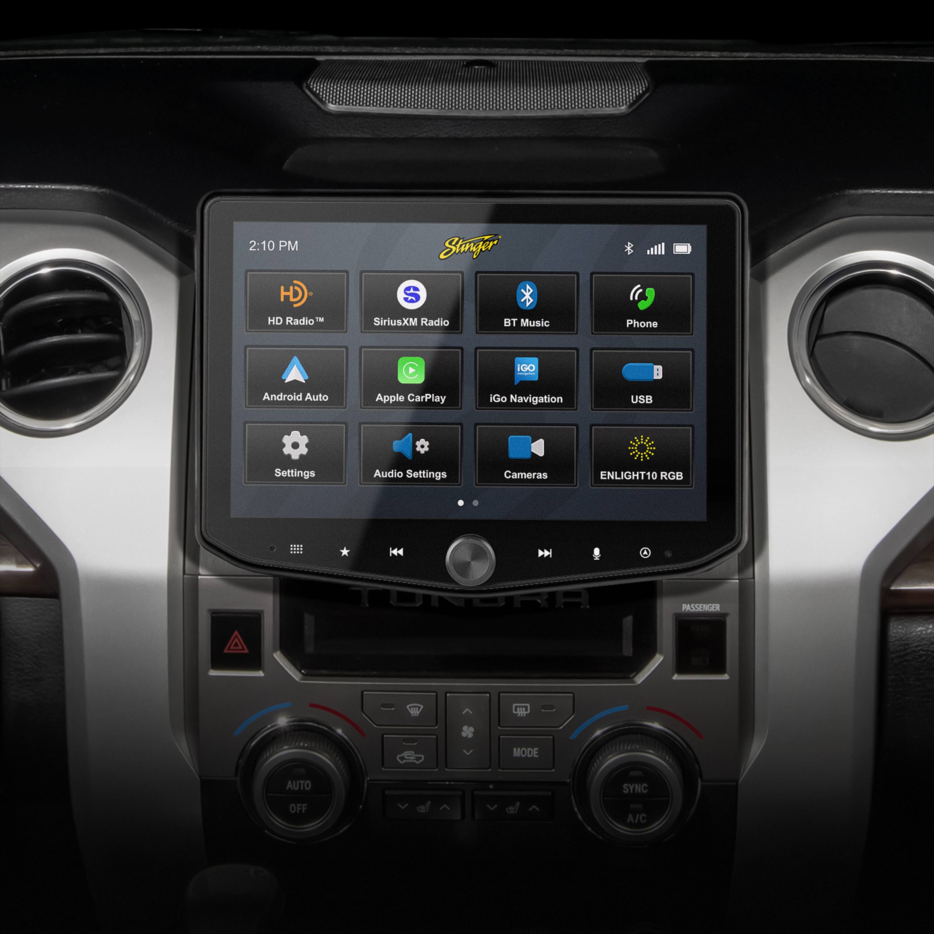 The text on the image reads:
2:10 PM Stinger H HD Radio - S SiriusXM Radio BT Music Phone IGO Android Auto Apple CarPlay IGo Navigation USB Settings Audio Settings Cameras ENLIGHT10 RGB H44 H44 TURGRA PASSENCER MODE AUTO SYNC OFF A/C
This text is likely related to the settings and features of a car's entertainment system, including options for radio, music, navigation, and other functions.