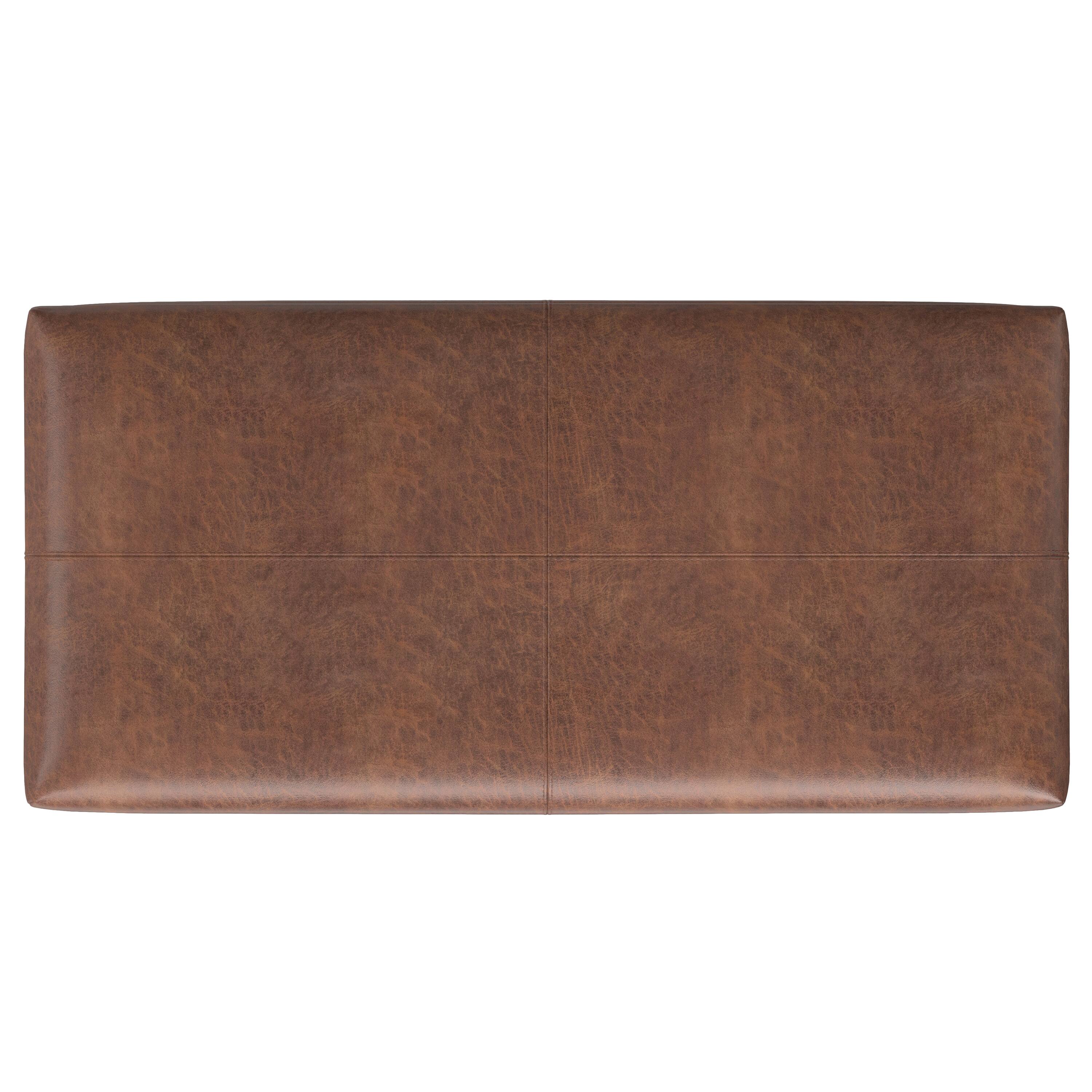 Alt View 1. Simpli Home - Gabbie 48 inch Wide Rectangular Storage Ottoman in Distressed Saddle Brown Vegan Leather - Distressed Saddle Brown.