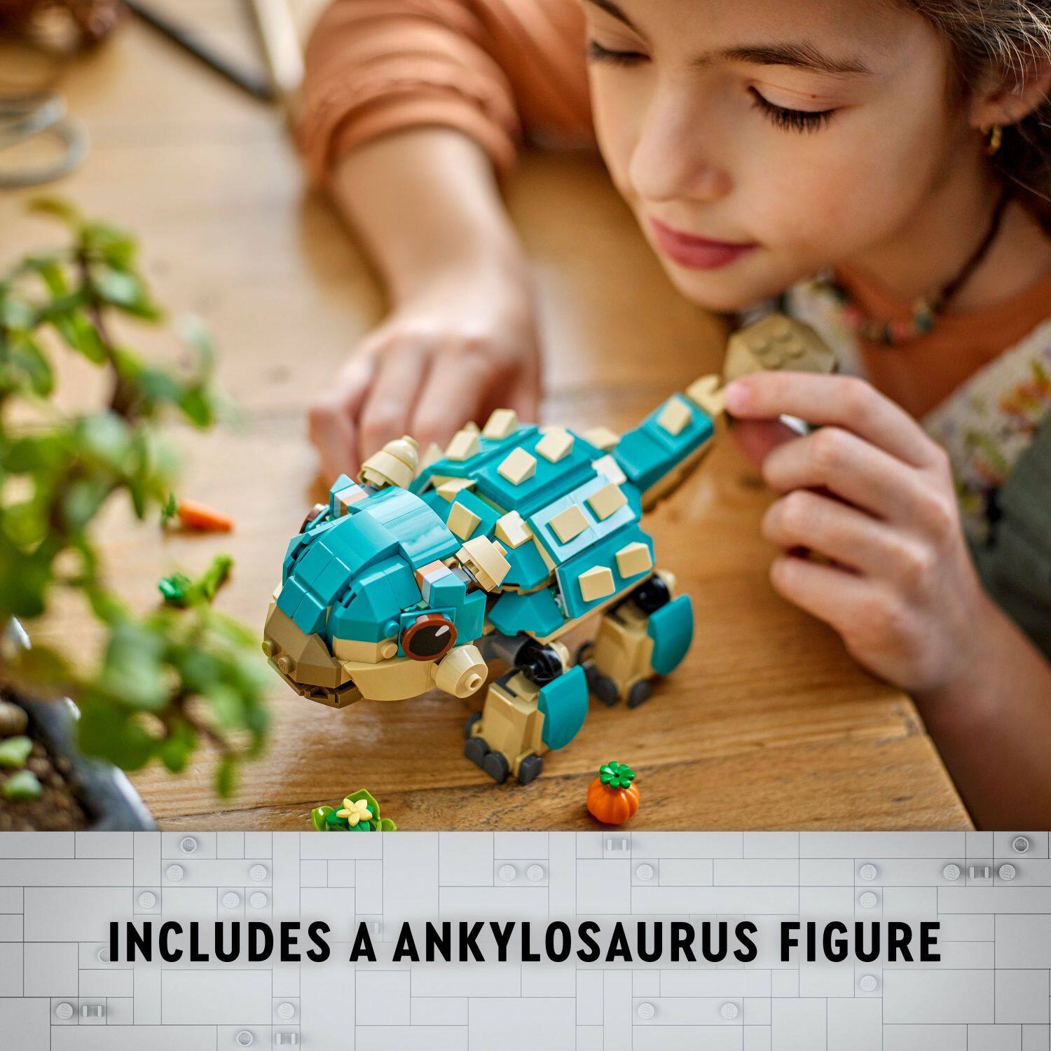 The text on the image reads "Includes a Ankylosaurus Figure."