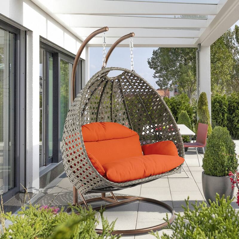 Left. LeisureMod - Leisuremod 2-Person Wicker Egg Swing Chair with Stand & Washable Cushions - Indoor/Outdoor Double Hanging Patio Chair - Orange.