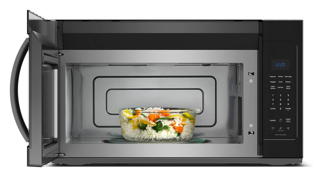 12:20  
Popcorn Potato Beverage Veggie Cook Reheat Defrost Sofien Kap Warm  
1 2 3 4 5 6 7 8 9  
CLOCK 0  
POWER CANCEL START -