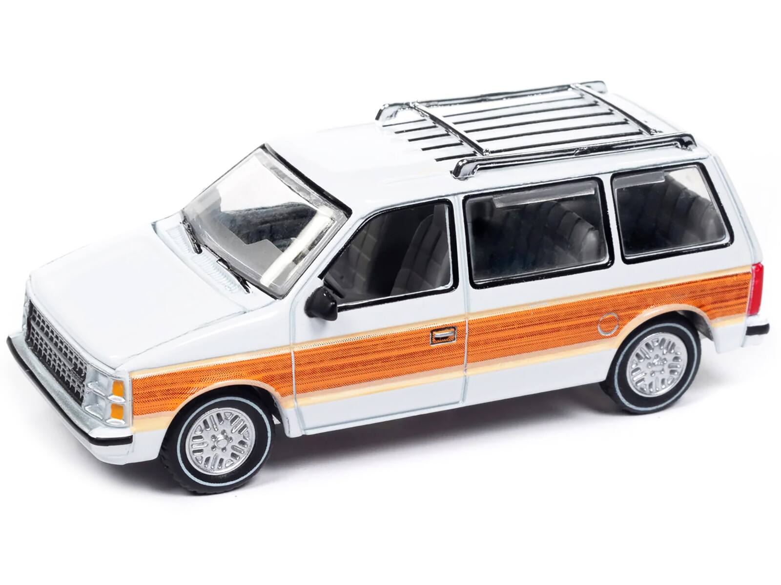 Angle. Autoworld - 1985 Dodge Caravan Van White with Woodgrain Side Panels "Mighty Minivans" Series 1/64 Diecast Model Car by Auto World - White.
