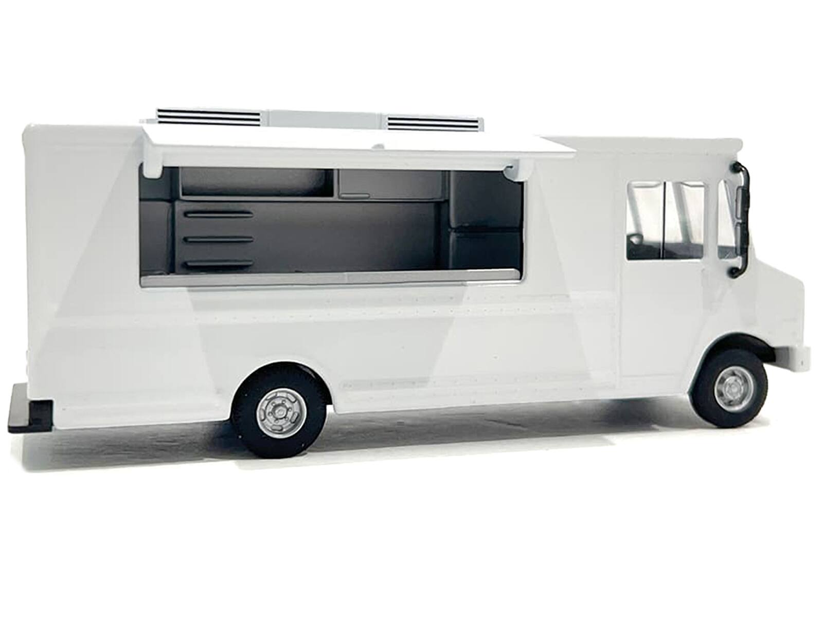 Left. American Diorama - Food Truck Plain White with Graphics 1/64 Diecast Model by American Diorama - White.
