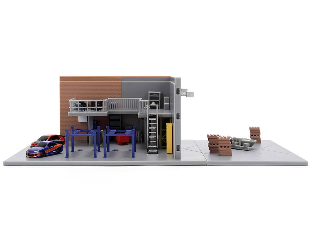 Left. Jada - "Fast & Furious" Han's Garage Diorama with 2 Cars and Accessories "Nano Scene" Series 1/32 Model by Jada - Multicolor.