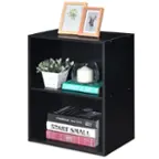 The image features a black bookshelf with various items on it. There are two books, one of which is titled "Fashion Ideal Home," and the other is titled "Start Small." A vase with flowers is also placed on the shelf, adding a touch of greenery to the scene. A candle is also present, providing a warm and cozy atmosphere. The bookshelf is positioned on a table, making it a functional and decorative piece in the room.